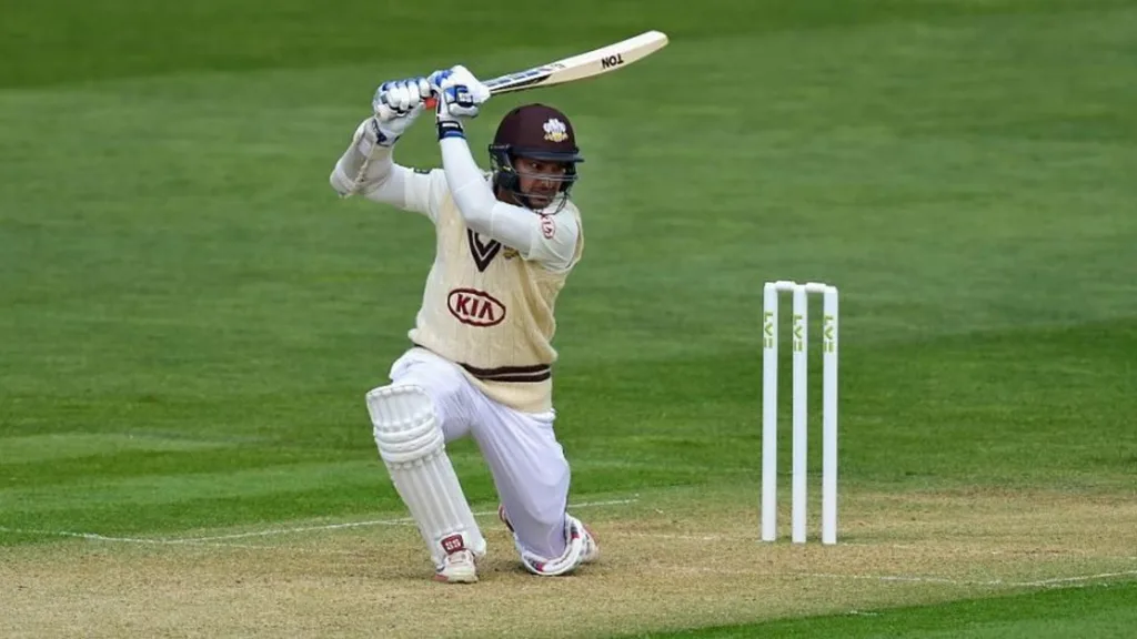 Brian Lara playing a stylish cover drive with signature elegance, timing, and left-handed batting flair