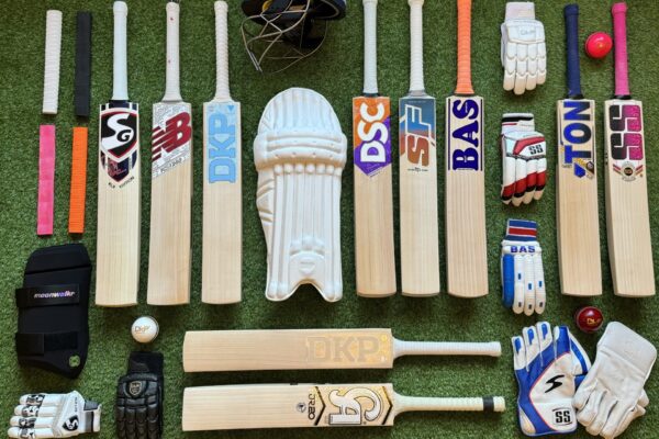 Professional batsman showcasing premium gear for Best Cricket Bats and Equipment Reviews 2025 season.